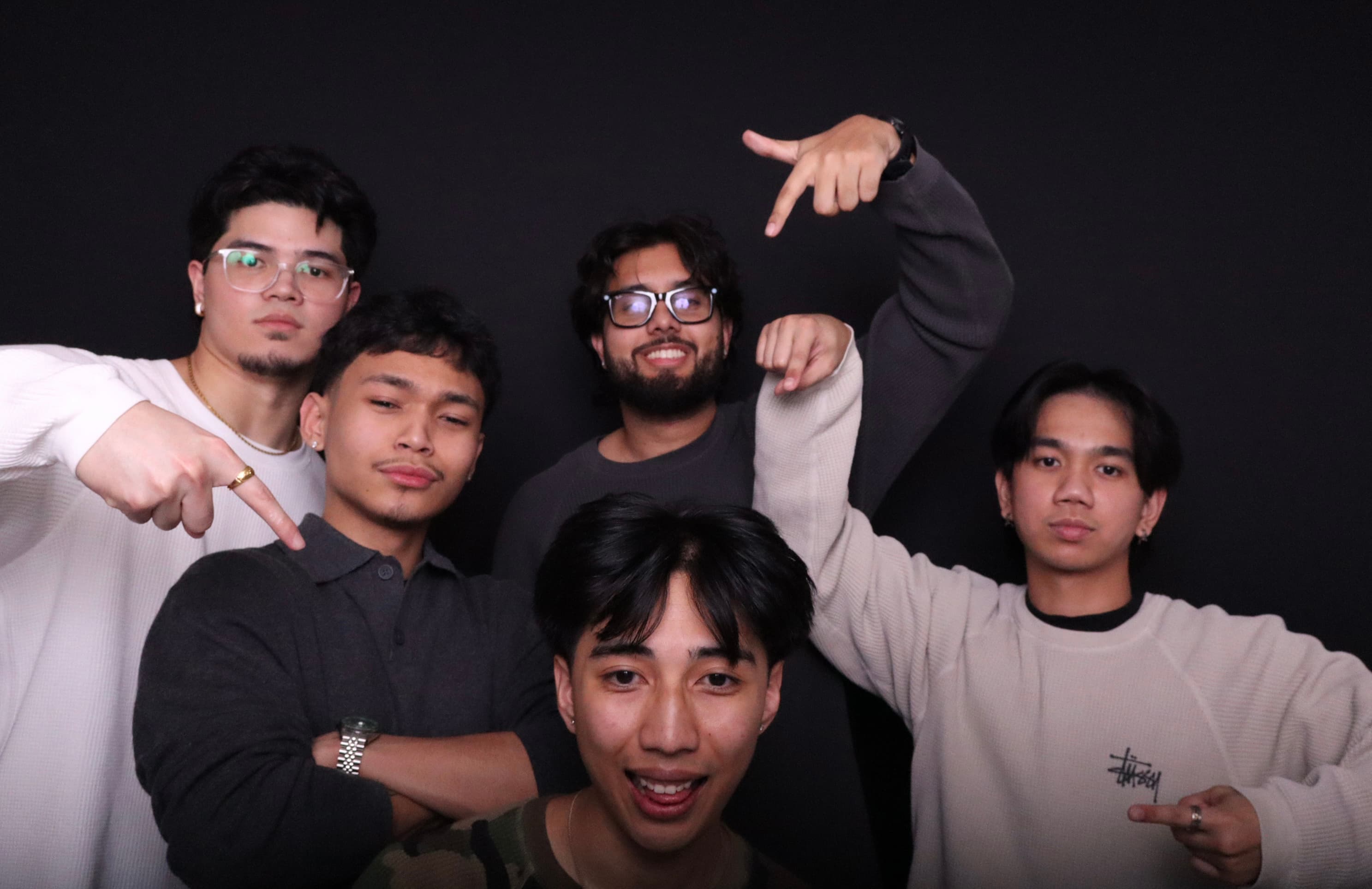 Group of guys posing at photo booth birthday event Vancouver