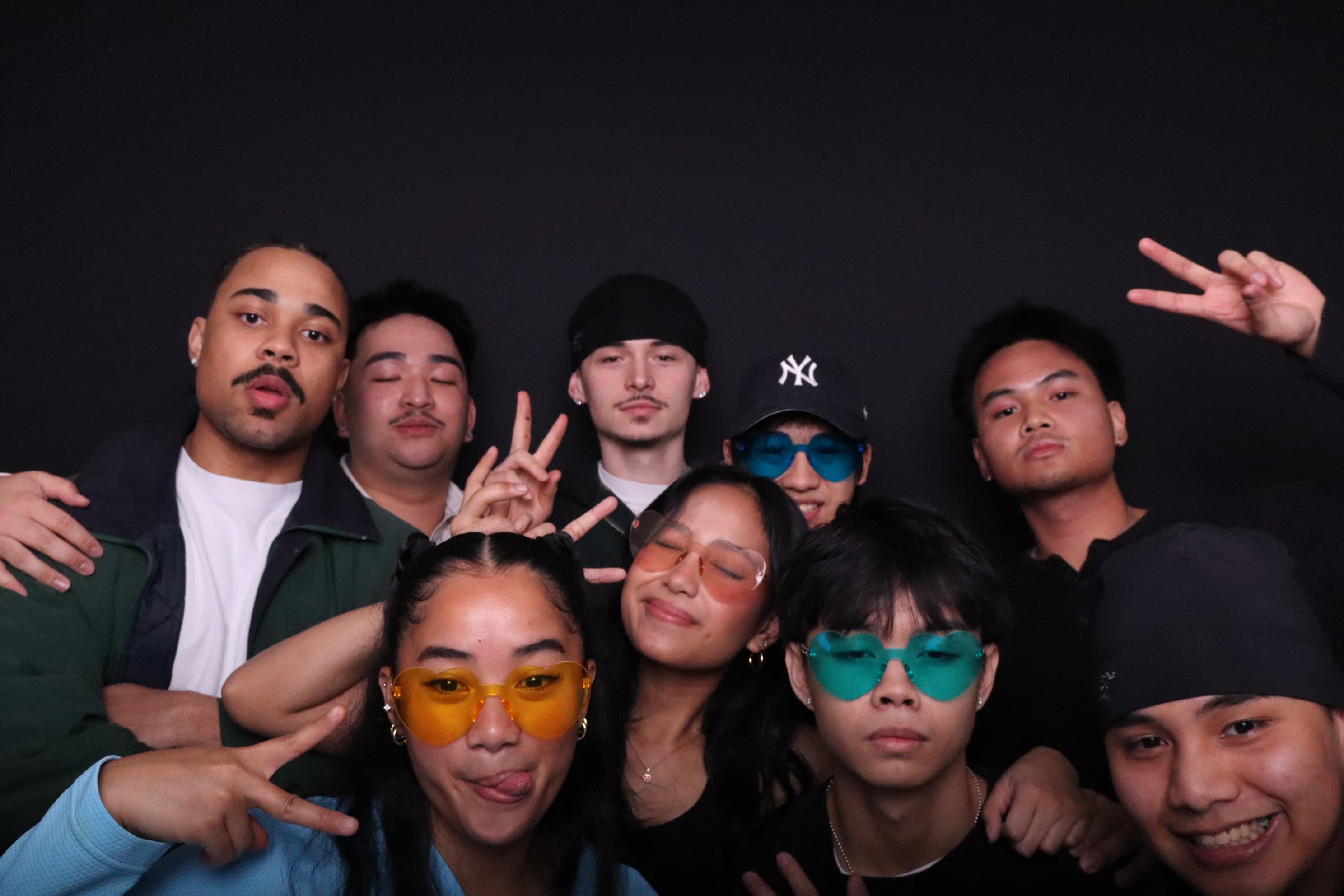 Large group wearing sunglasses at birthday photo booth Vancouver